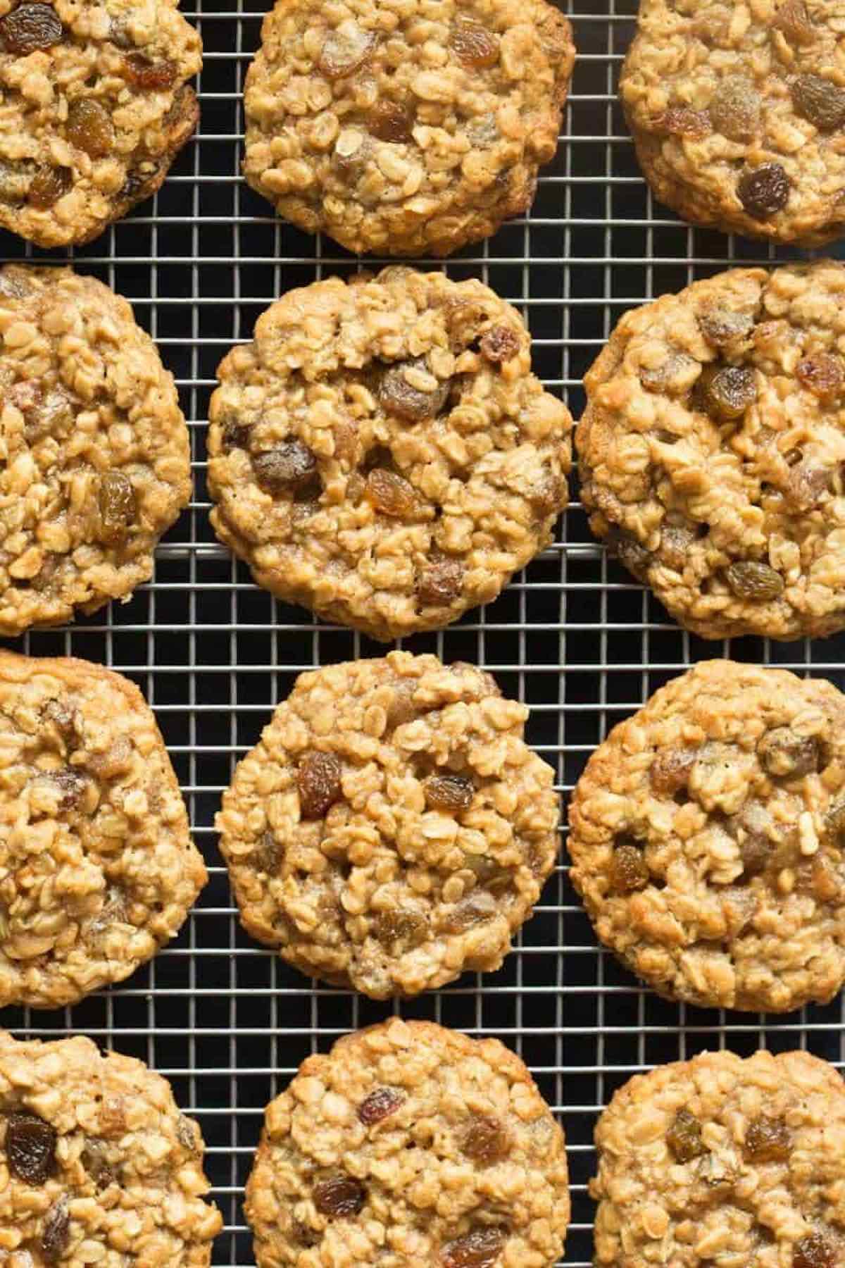 healthy oatmeal raisin cookies on a wire rack.