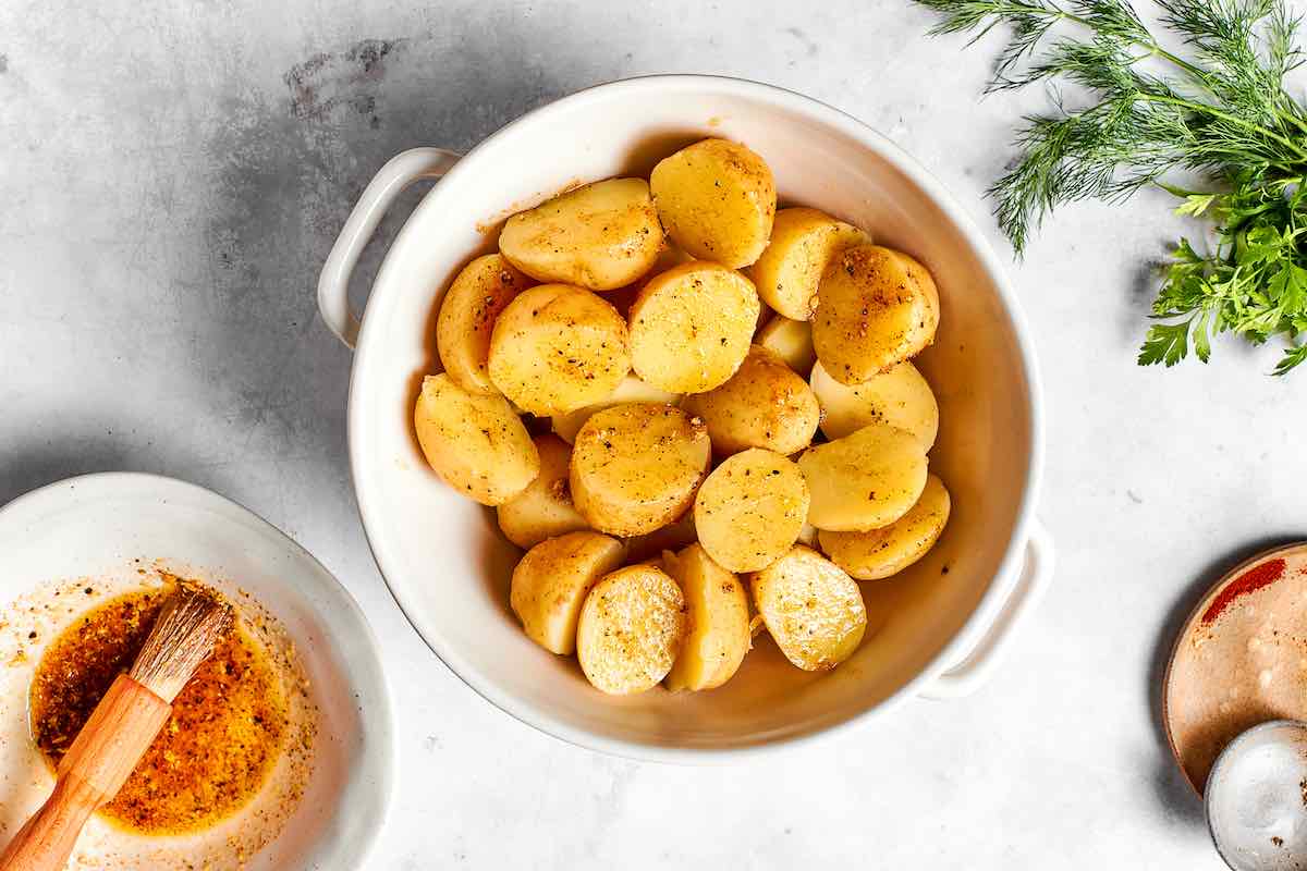 seasoned potatoes in a bowl.