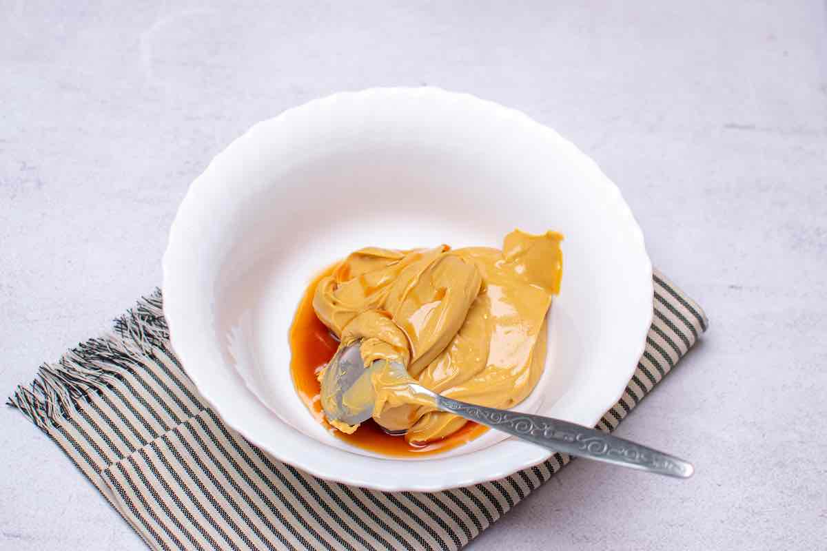 almond butter and maple syrup in a bowl.