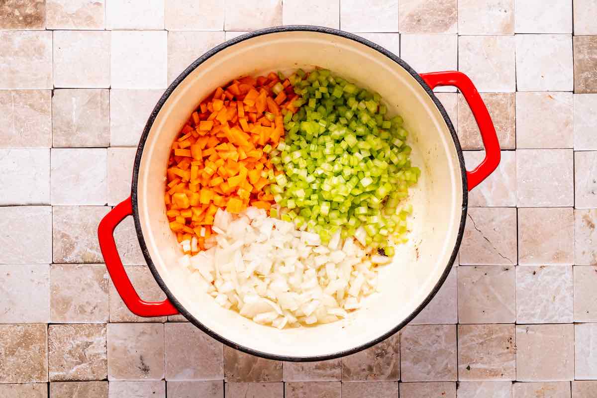 carrots, celery, and onion in a Dutch oven.