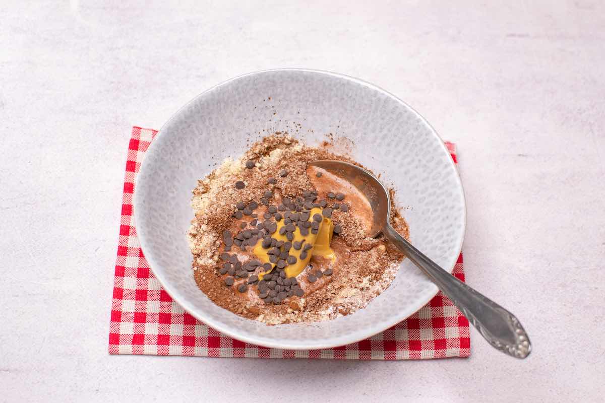wet and dry ingredients in a bowl.