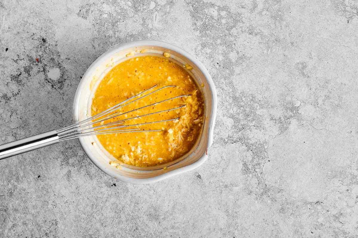 whisked eggs, cheese, cottage cheese, salt, and pepper.