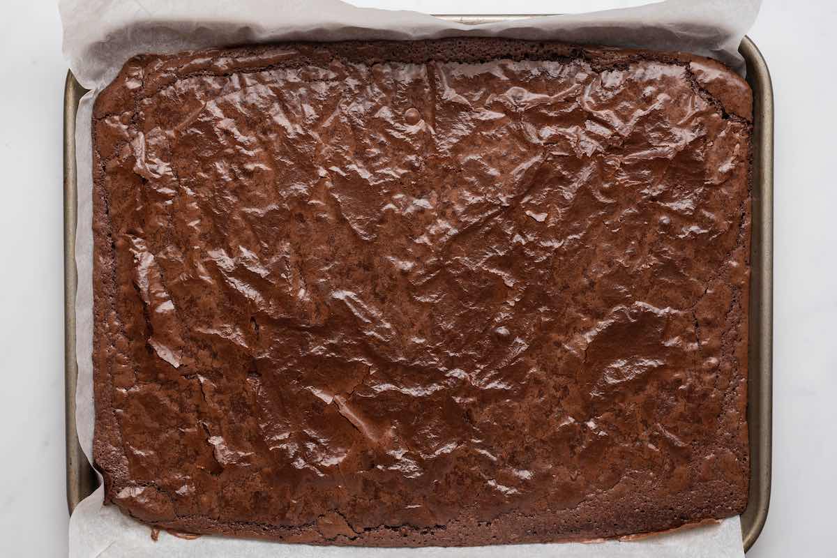 baked keto brownies in a baking dish.