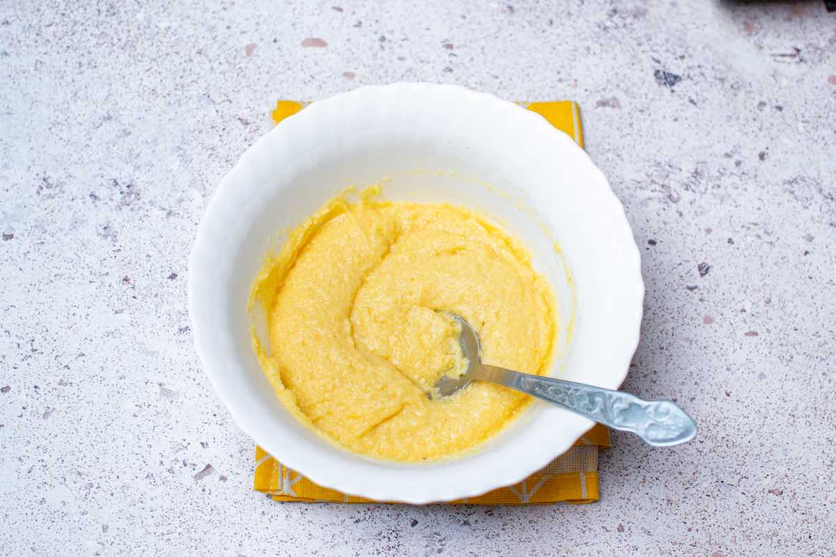lemon mug cake batter in a bowl.