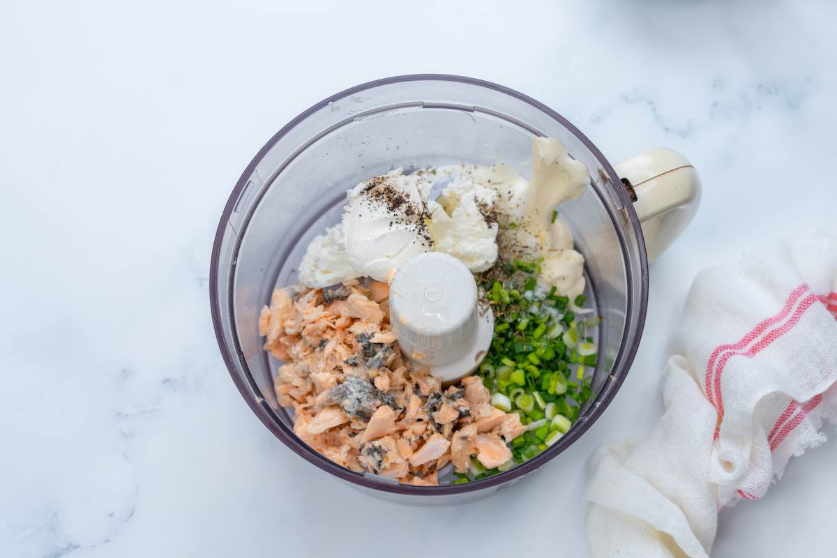 salmon, cream cheese, sour cream, and green onions in a blender.