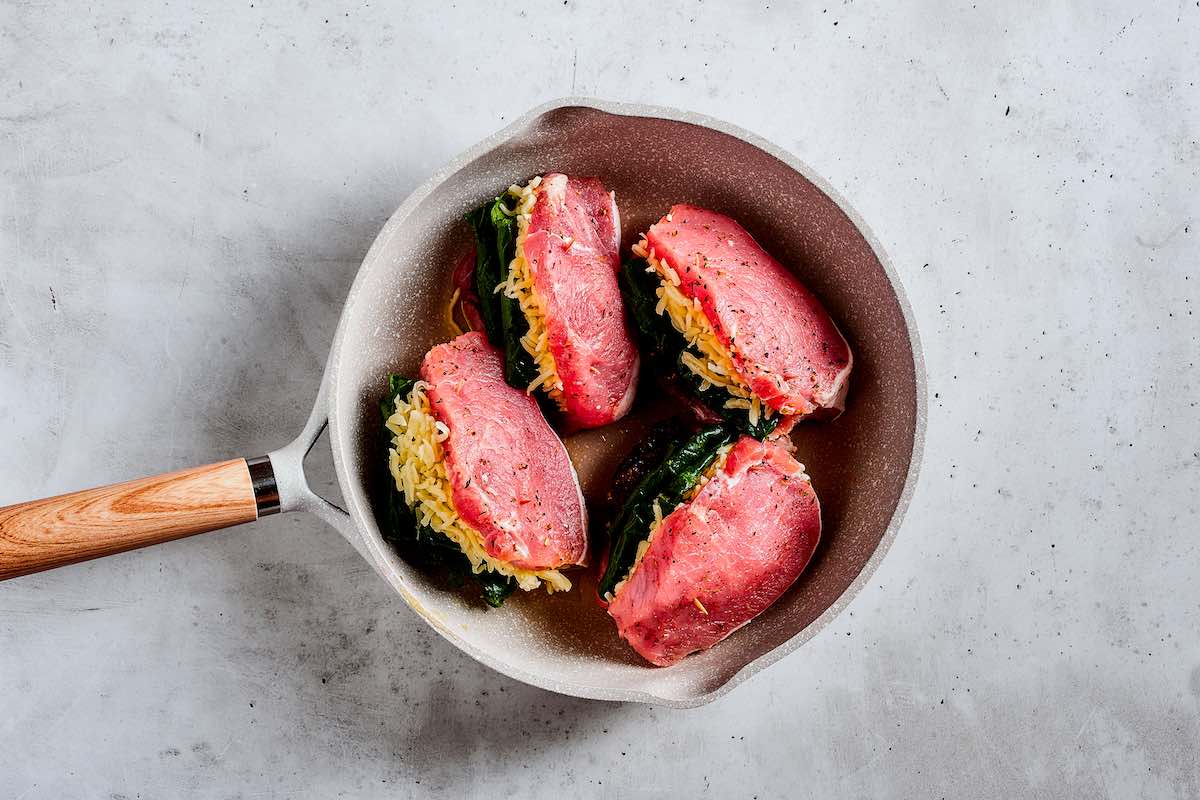 searing stuffed pork chops.
