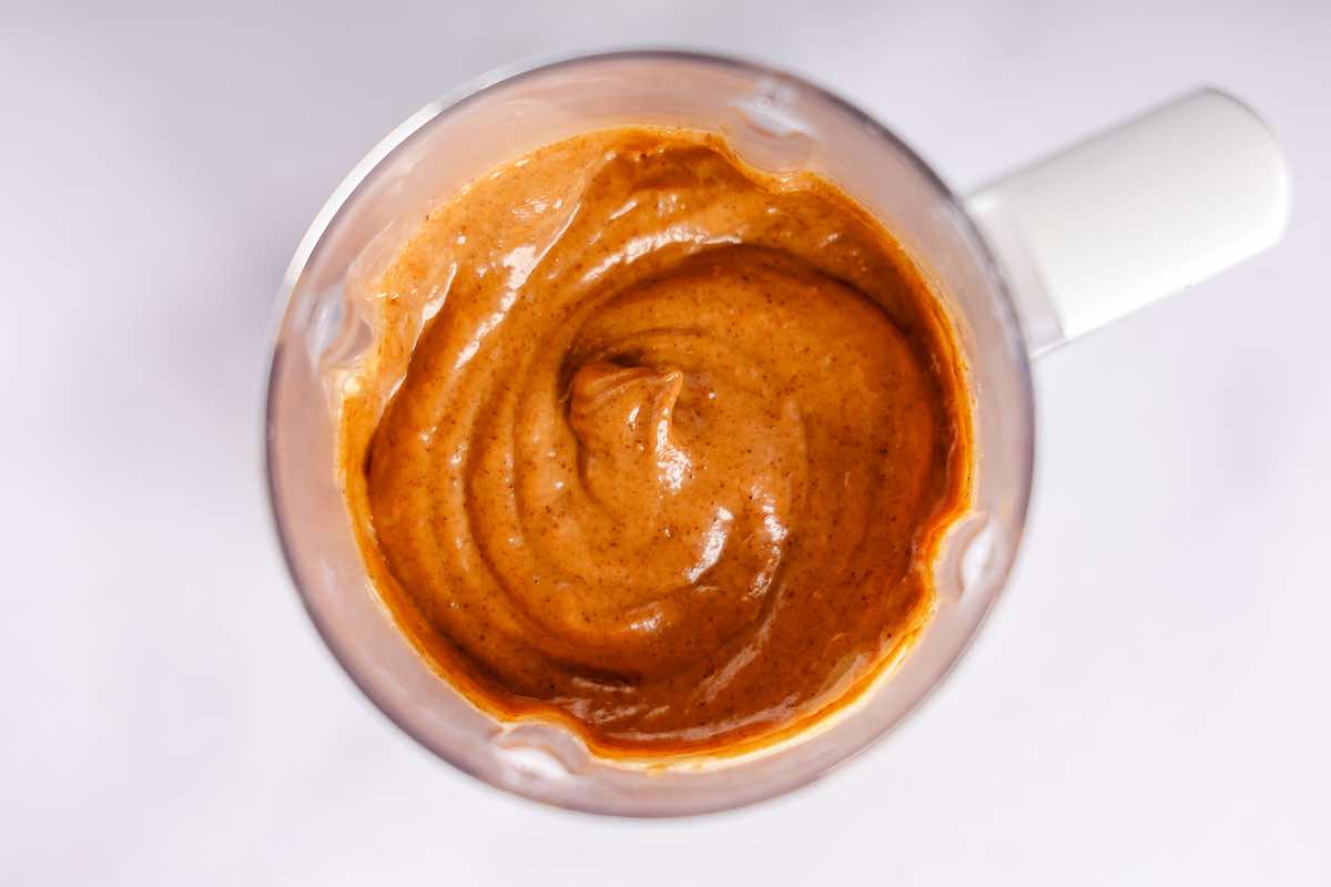 food processor with blended muffin mixture.
