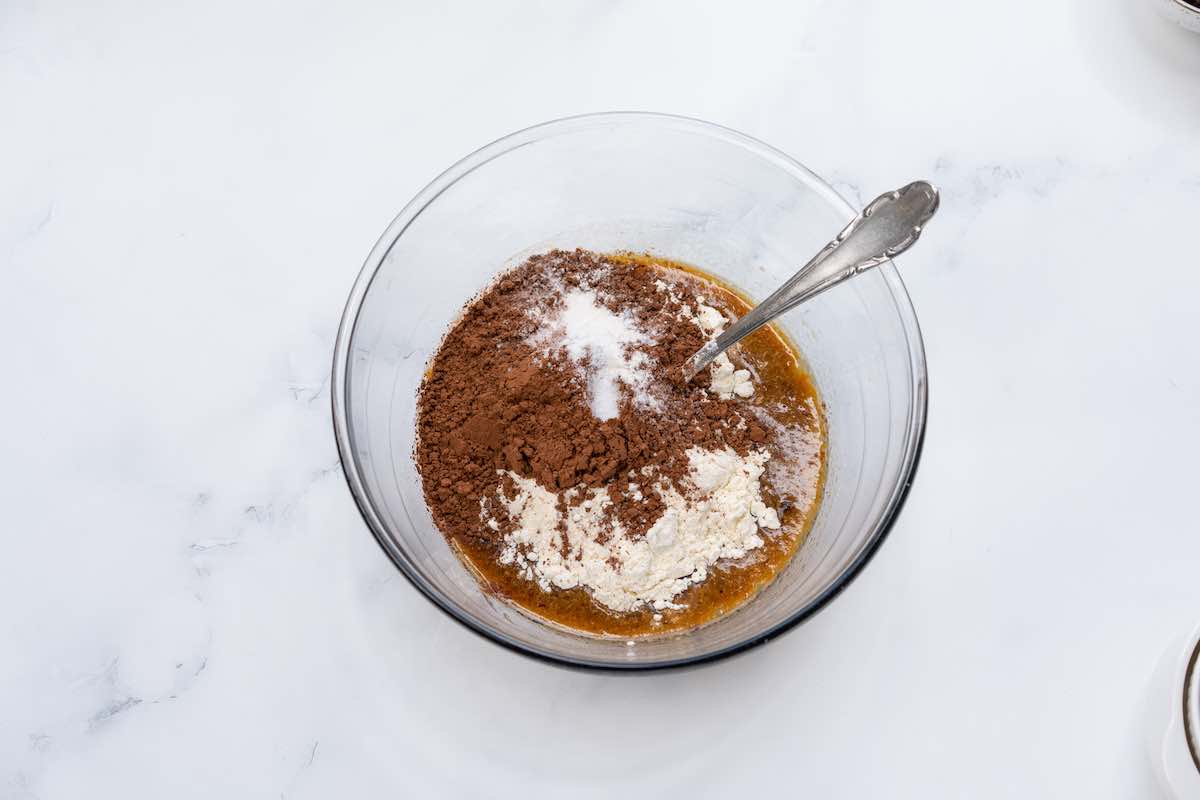 melted vegan butter, flour, cocoa powder in a bowl.