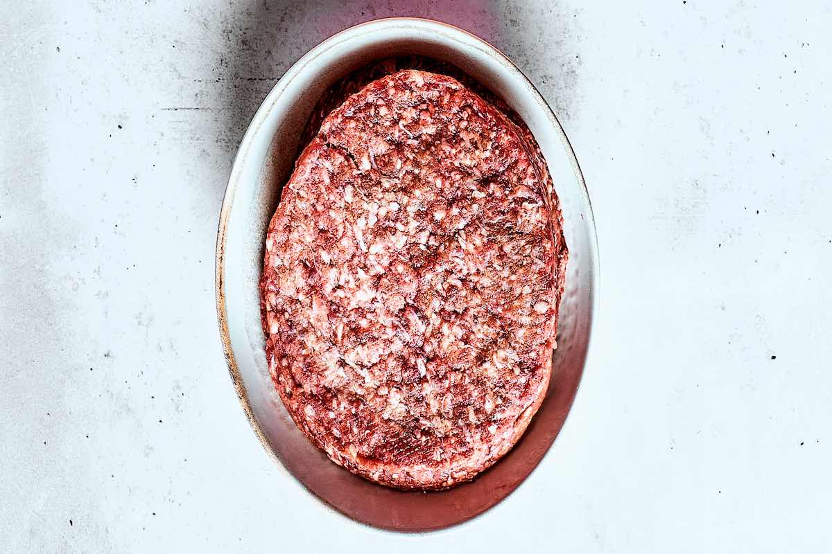 shaped raw wagyu beef burgers.