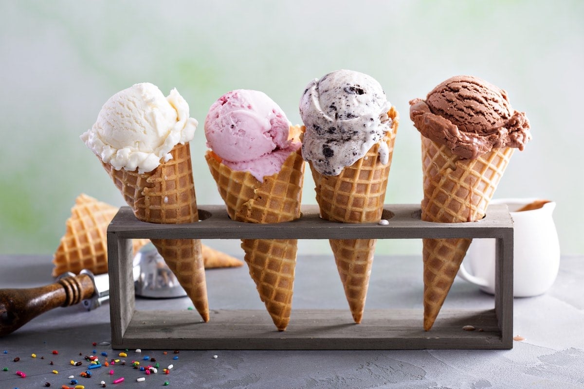 4 ice cream cones with ice cream. 