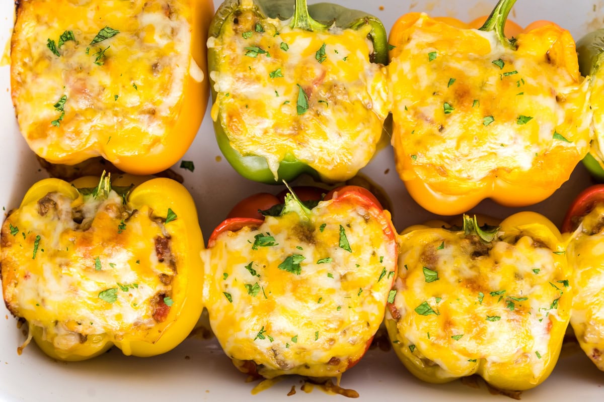 healthy stuffed peppers in a baking dish.