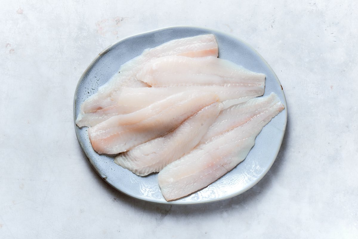 cod fillets on a plate.