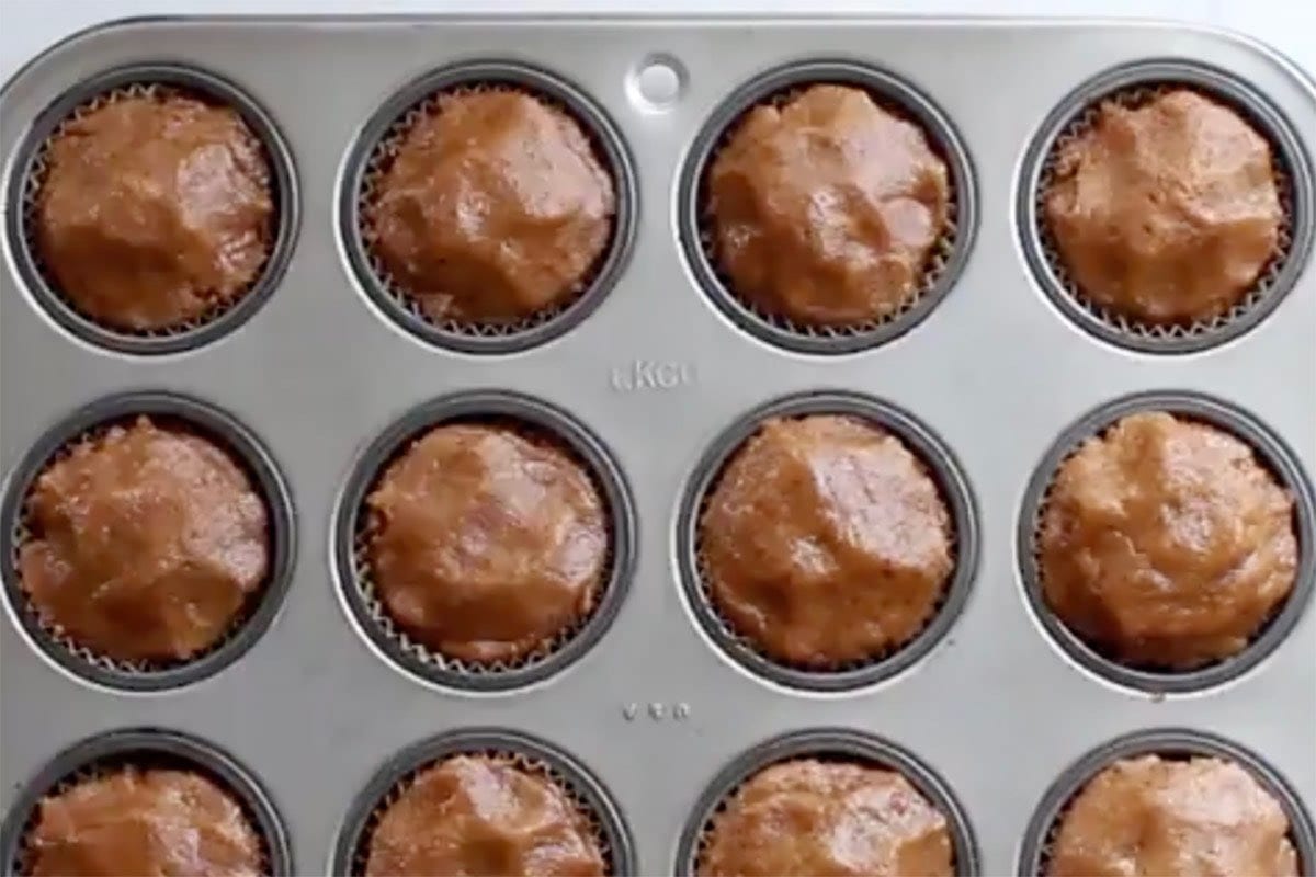 muffin batter in muffin tin.