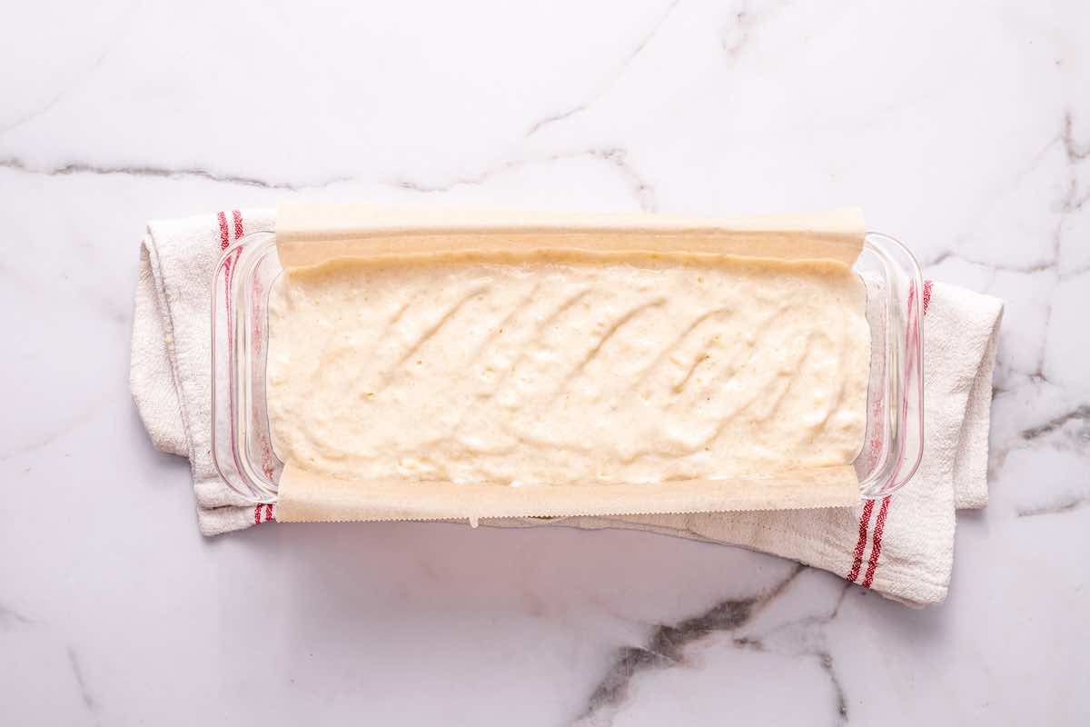 bread batter in loaf pan.