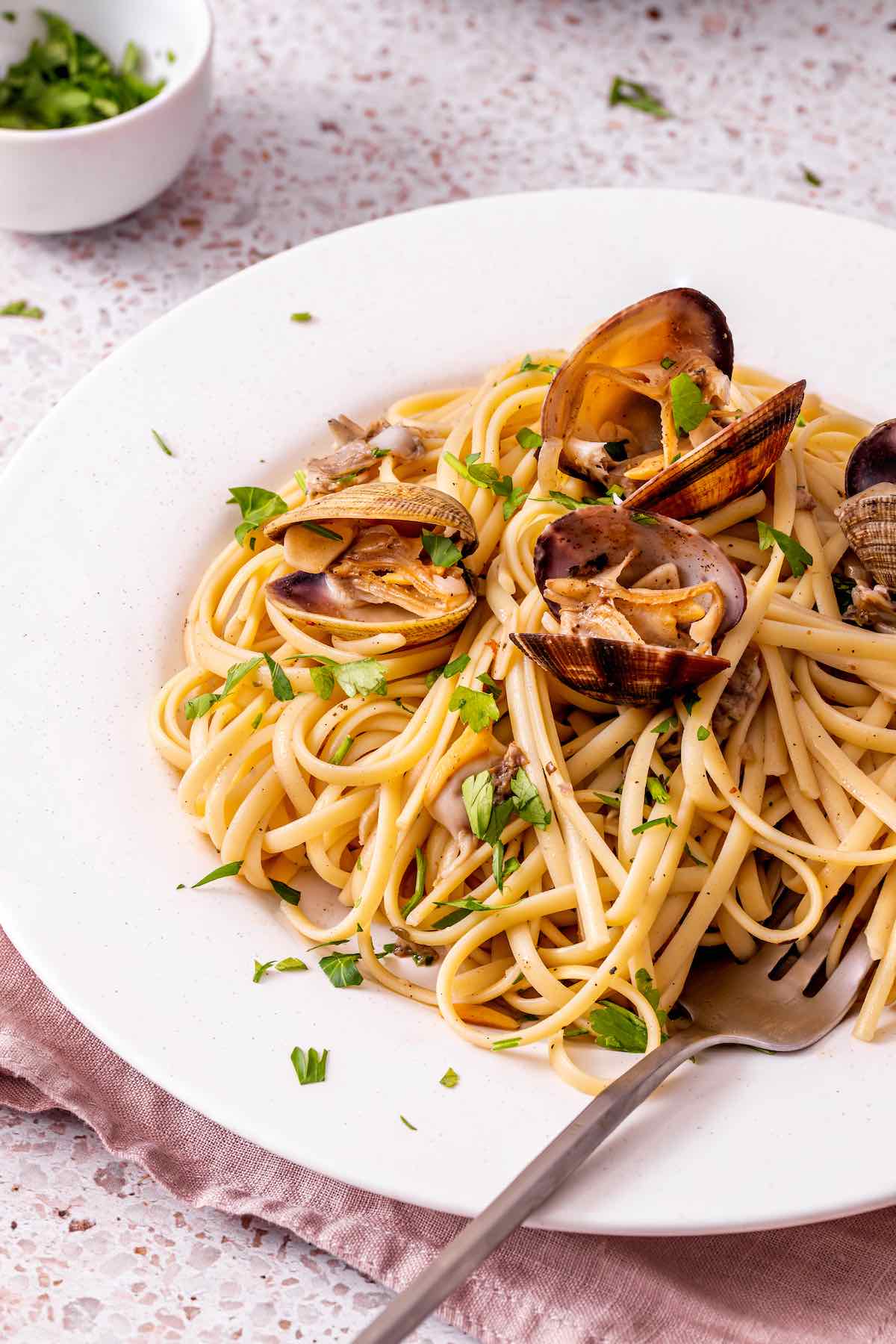 linguine with clams on a plate.