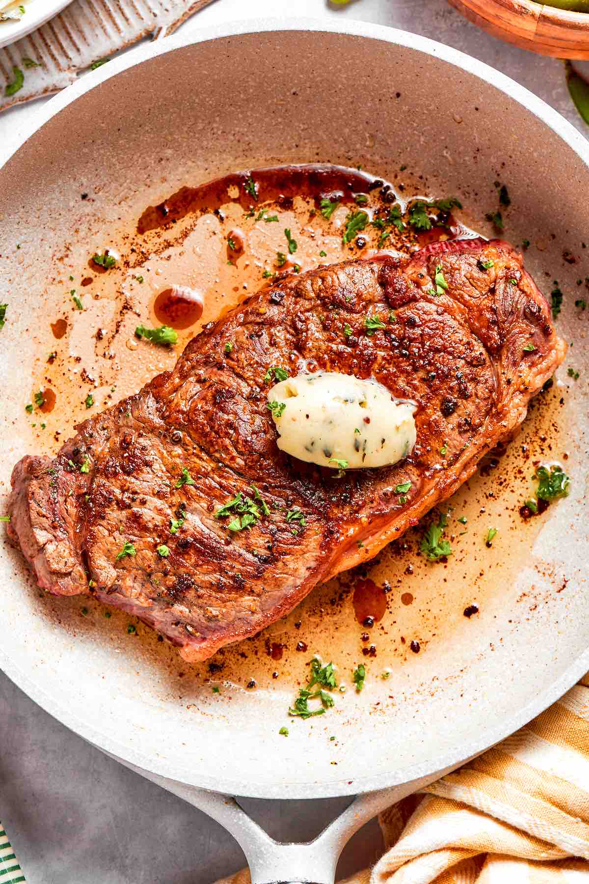 shoulder steak recipe with garlic butter on top.