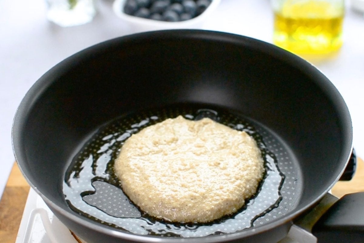 pancake cooking in skillet.