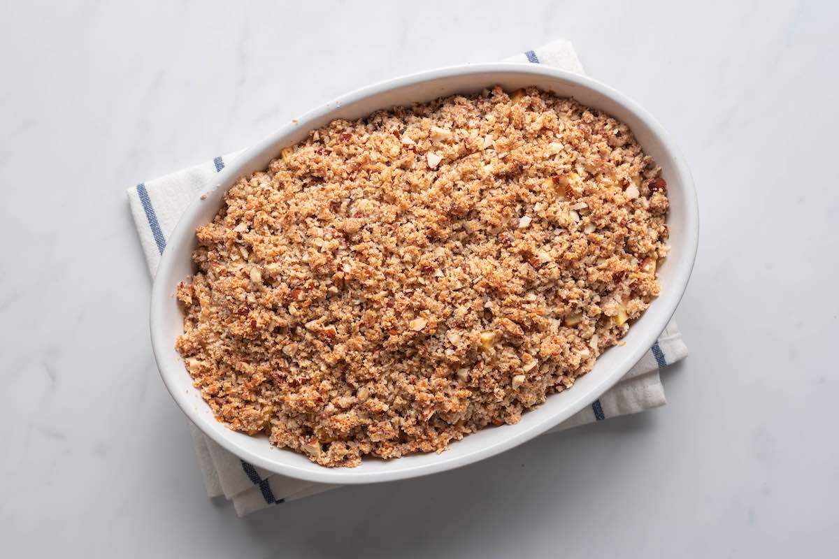 crumb topping added on top of chopped apples.