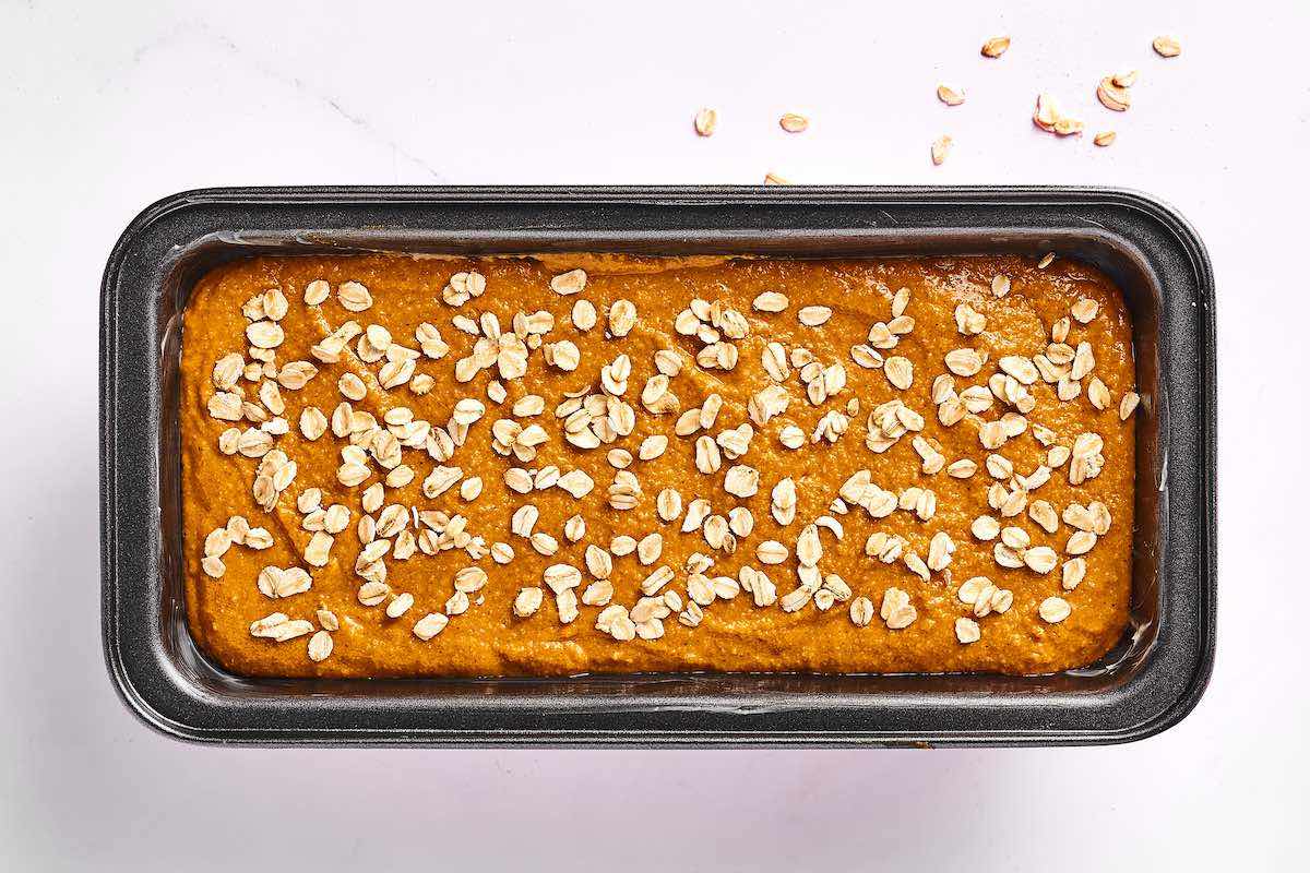pumpkin bread batter in loaf pan.