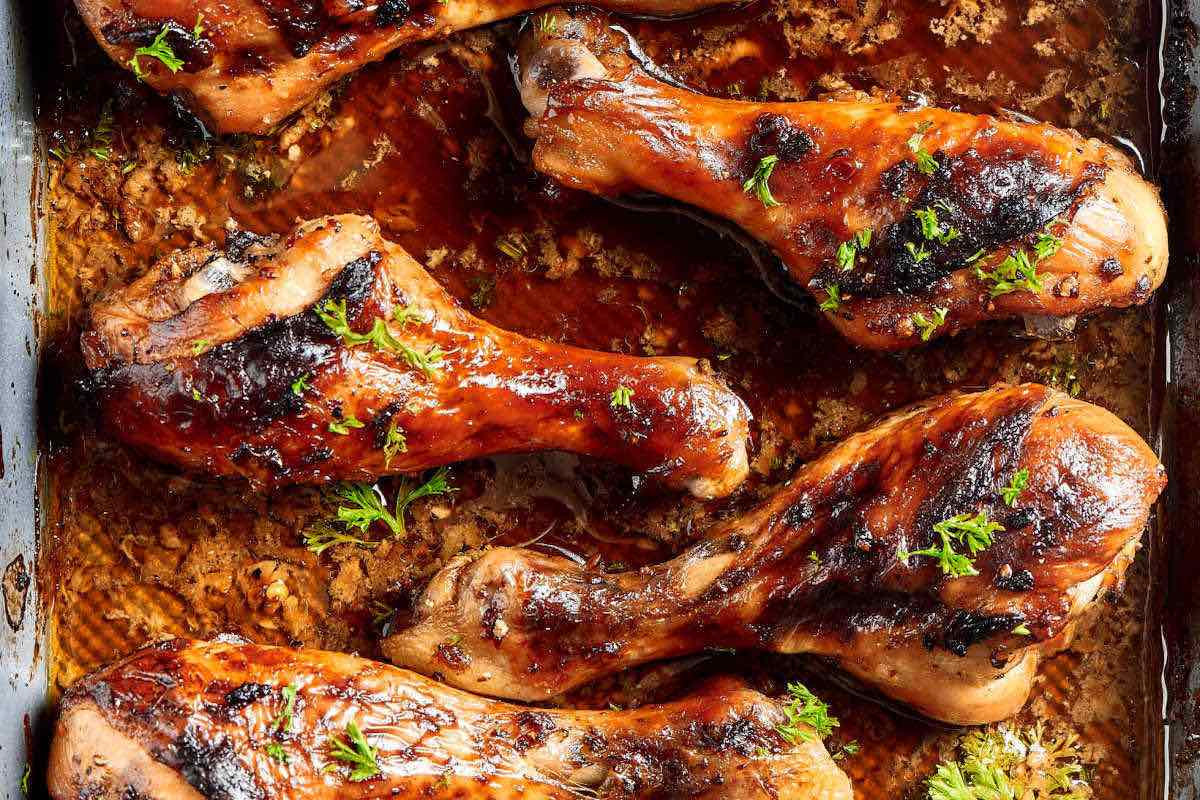 baked chicken legs on a wire rack.