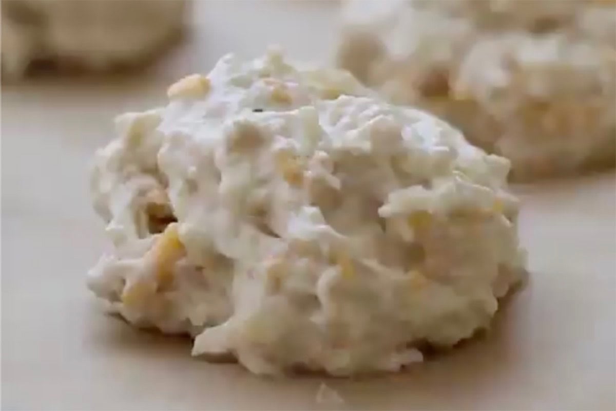shaped biscuits on baking sheet.