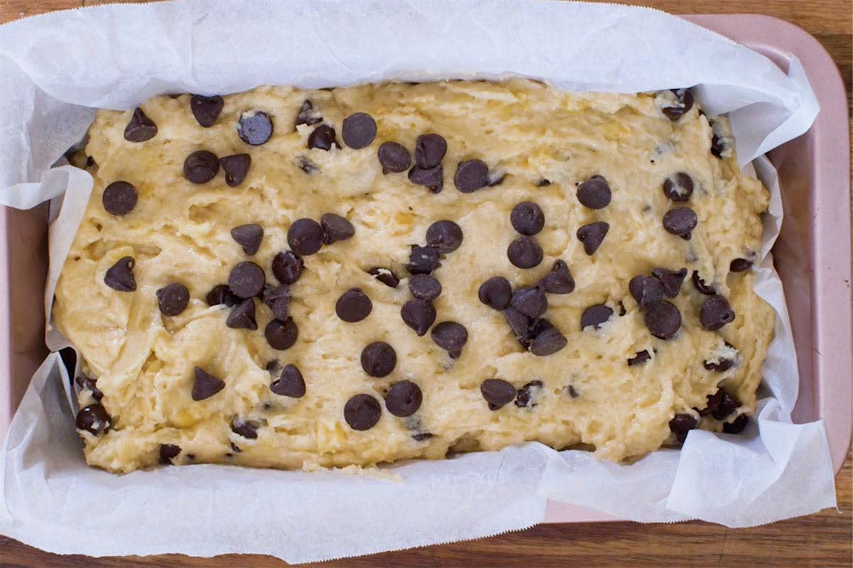 assembled banana chocolate chip bread in baking dish.