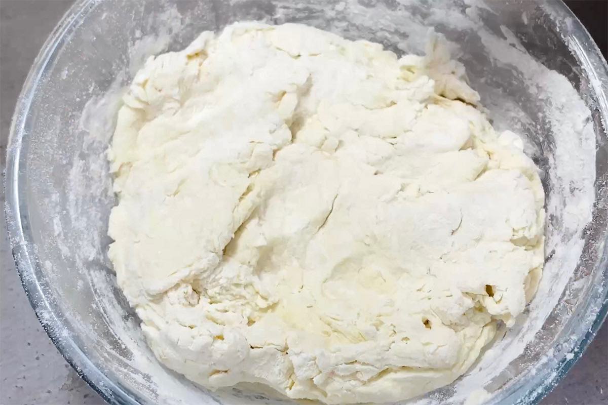 flour and vanilla yogurt mixed together in a bowl.