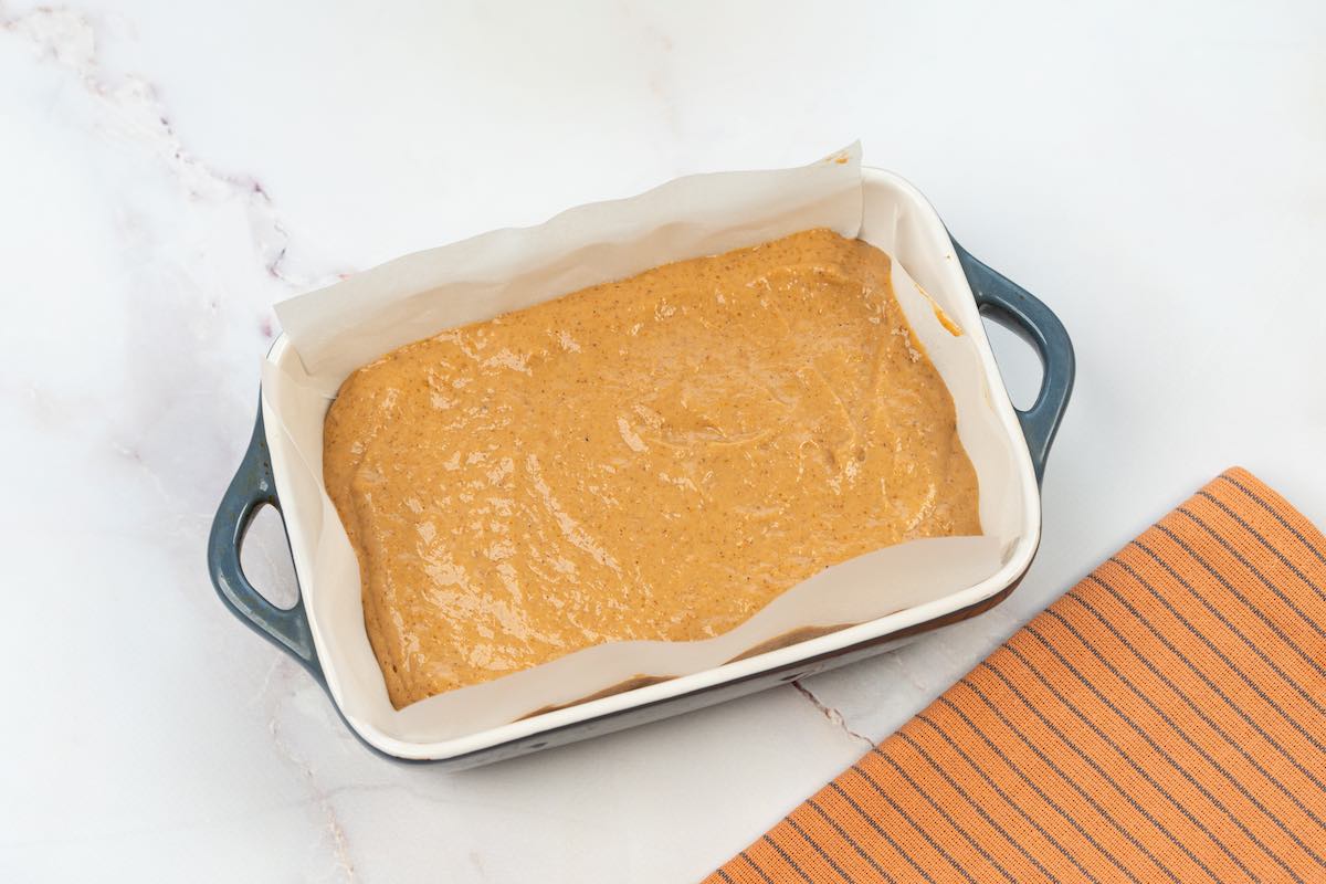 assembled cake in baking dish.