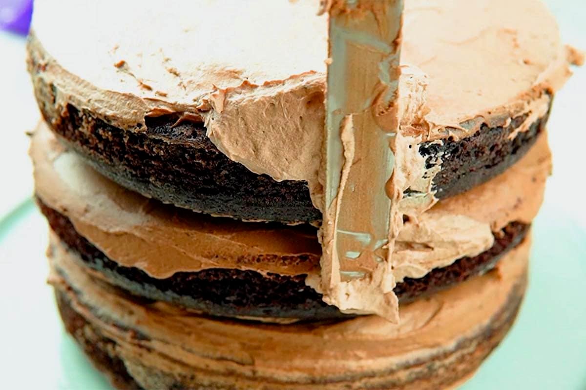 frosting vegan chocolate cake.