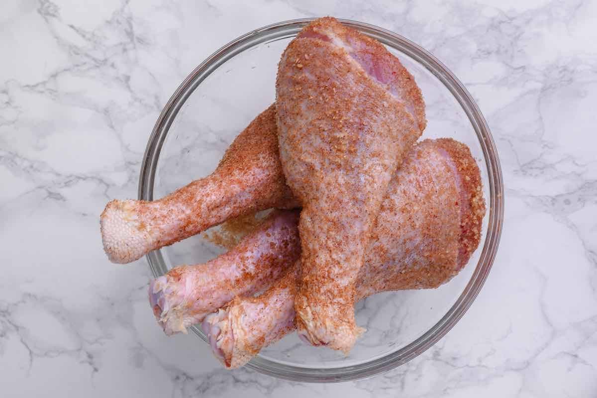 brined turkey legs seasoned with spice rub.