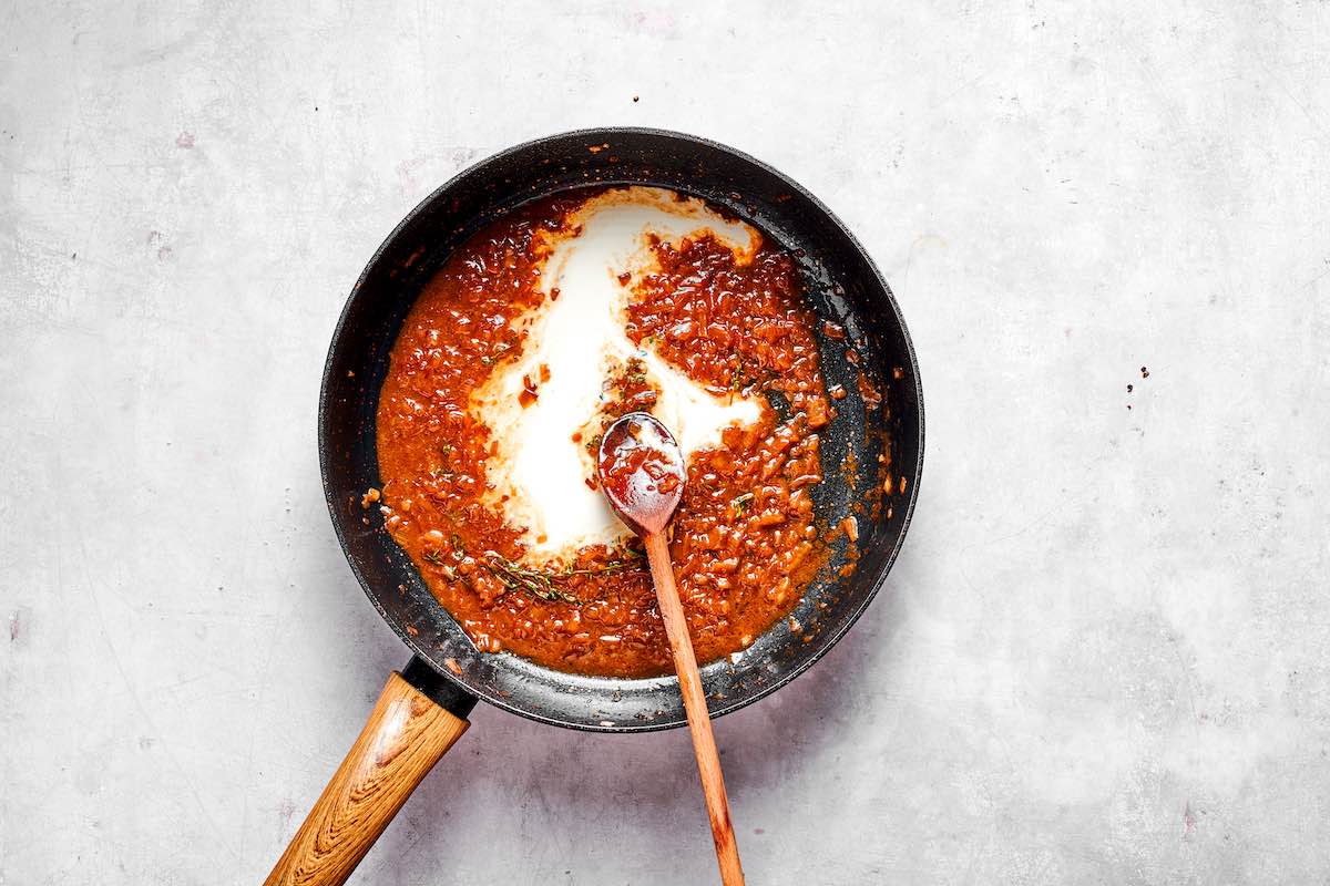 heavy cream added to broth and onion sauce.