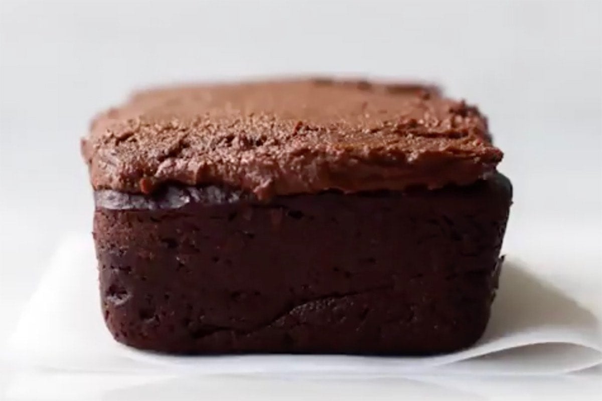 baked applesauce brownies with frosting on top.