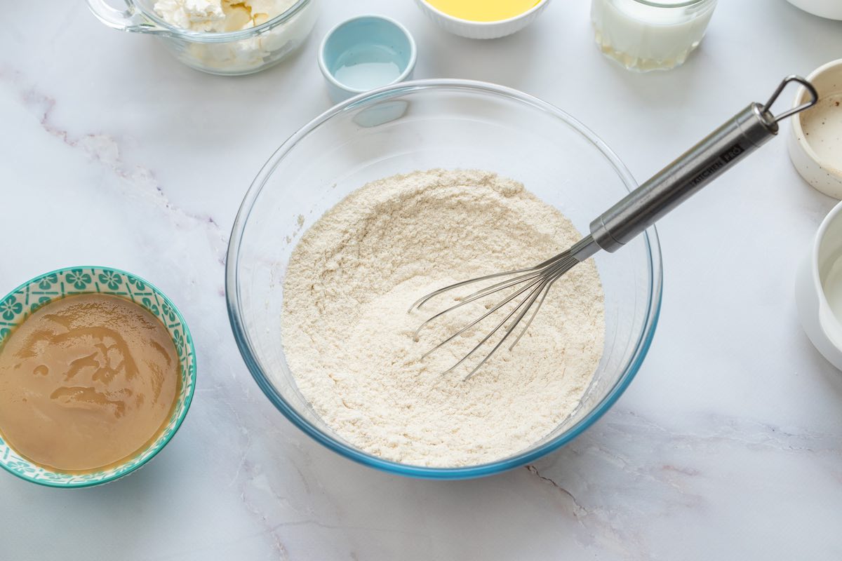 flour, sugar, and baking soda in a bowl.