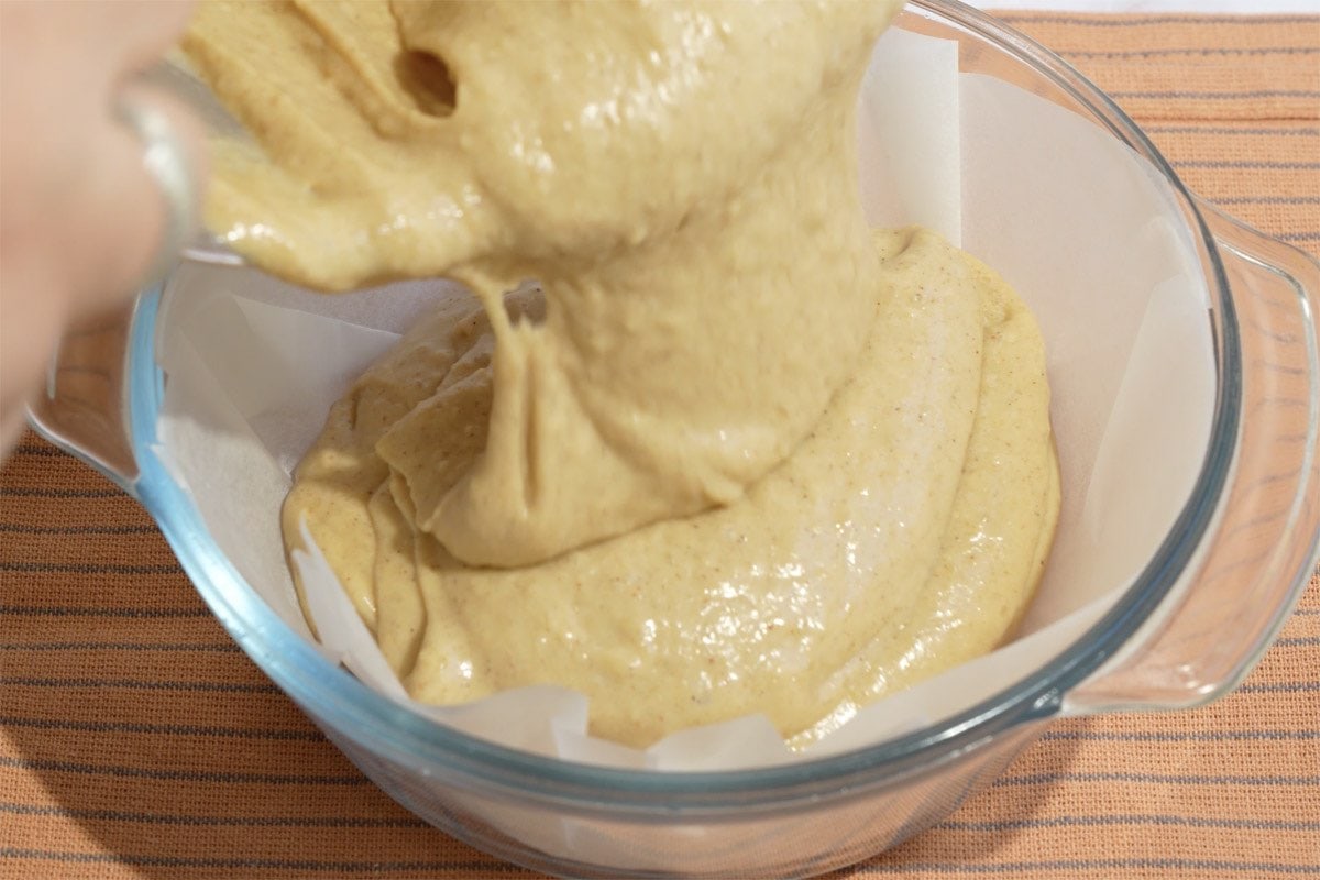 pouring batter in baking pan.