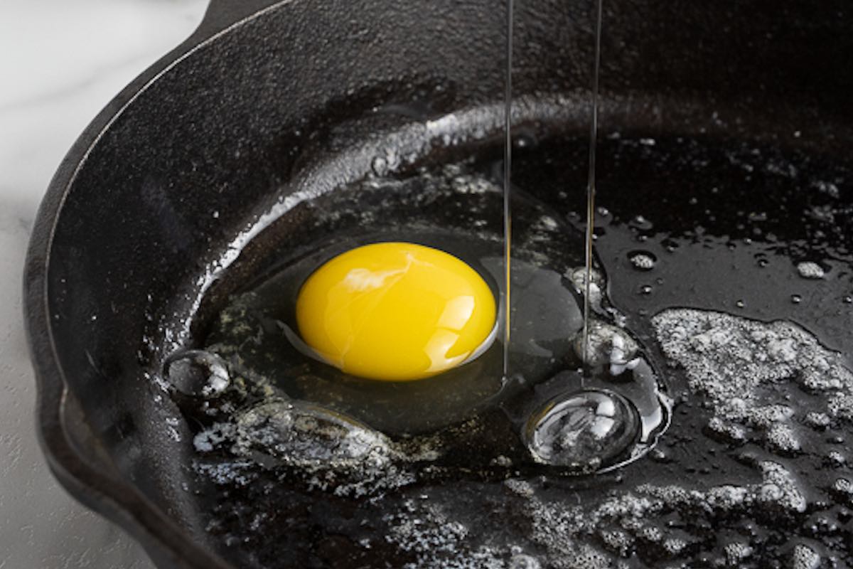 egg dropped on melted butter.