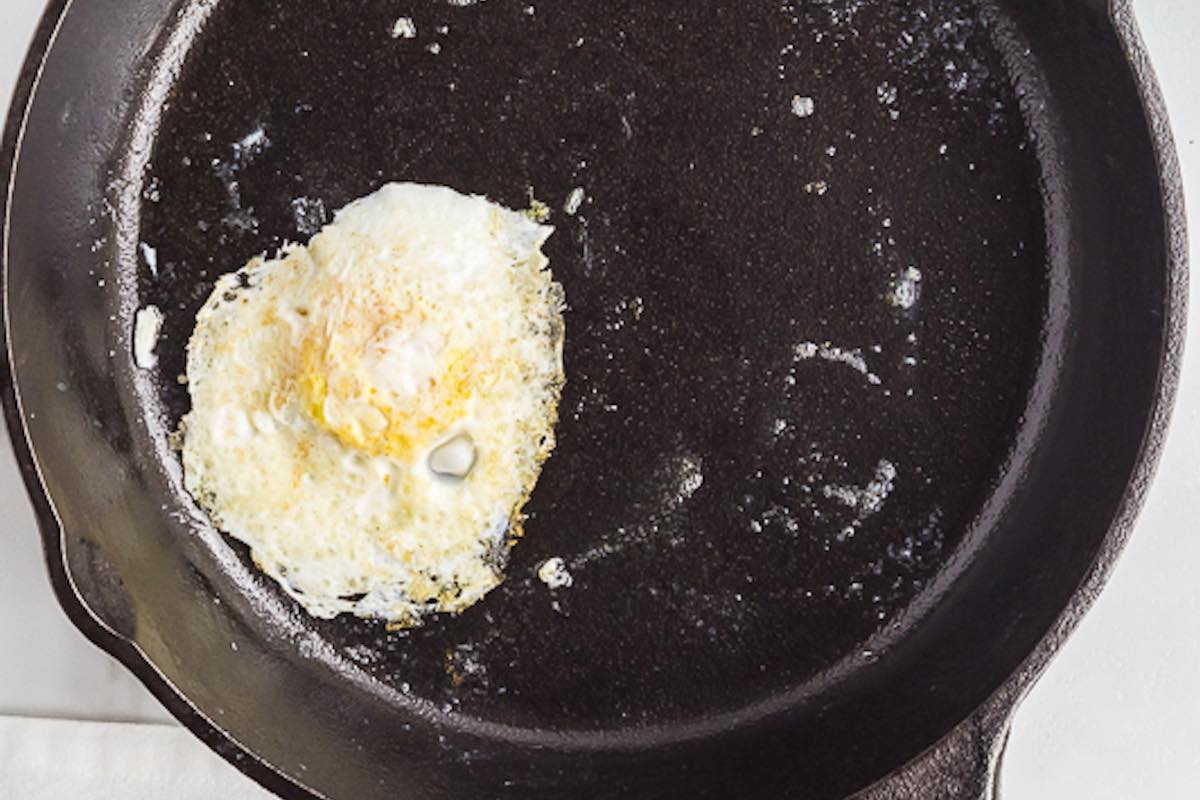 flipped egg in skillet with butter.