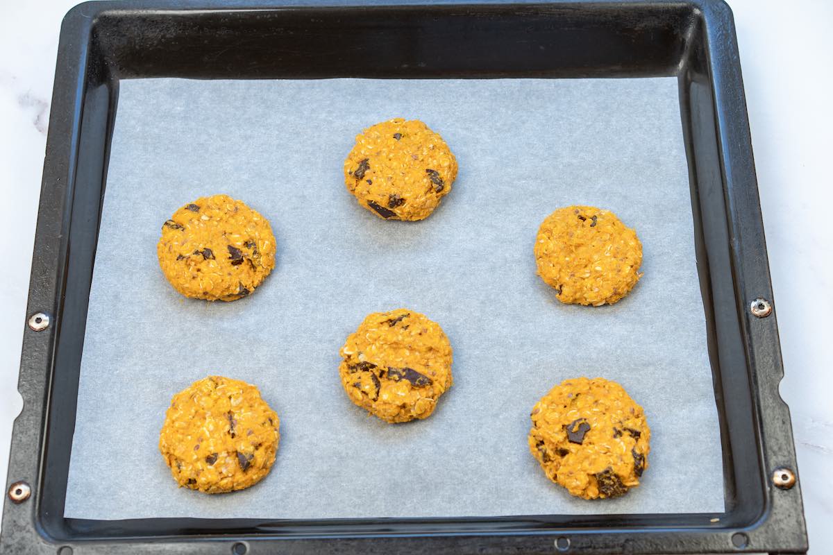 assembled unbaked cookies on a baking sheet.