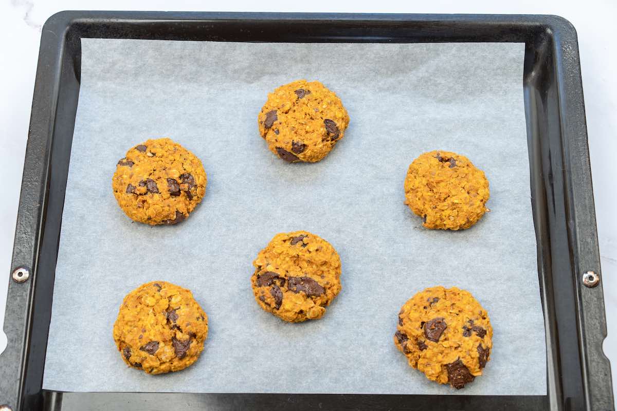 baked pumpkin breakfast cookies on baking sheet.