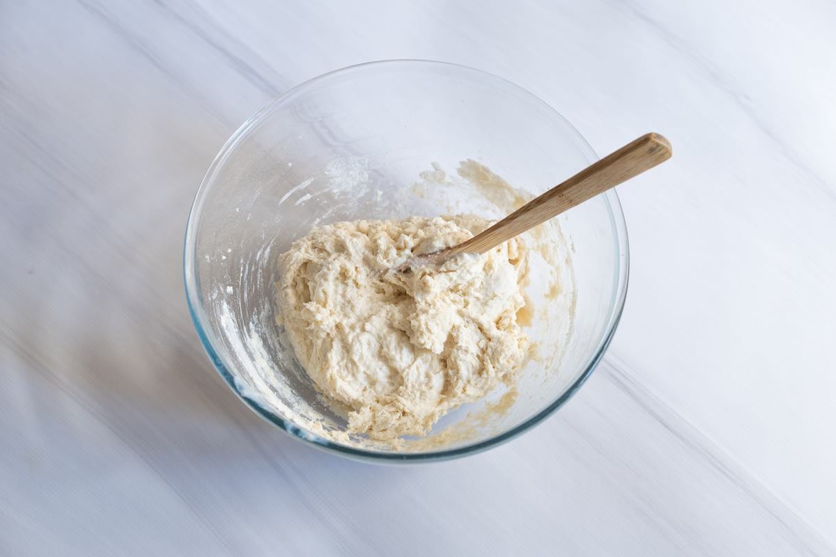 Greek yogurt and self-rising flour in a bowl.