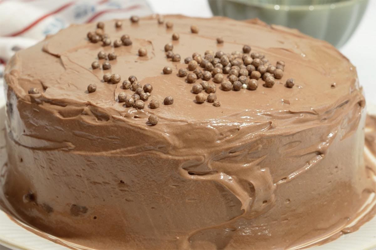 assembled and frosted sweet potato chocolate cake.