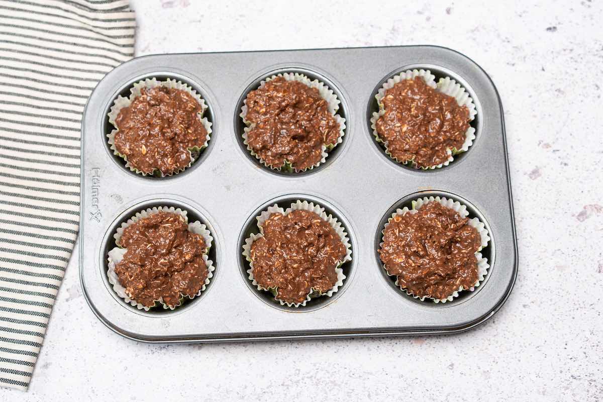 assembled muffin batter in muffin liners.