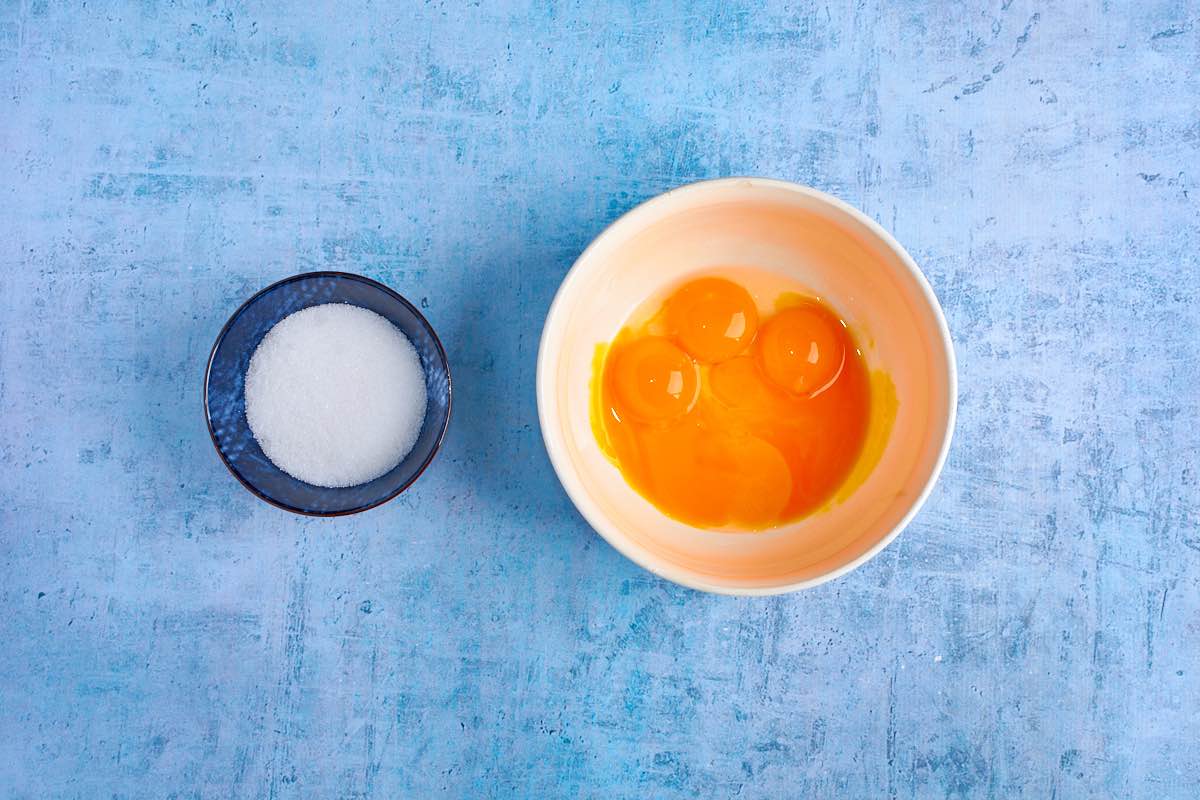 allulose and egg yolks in a bowl.