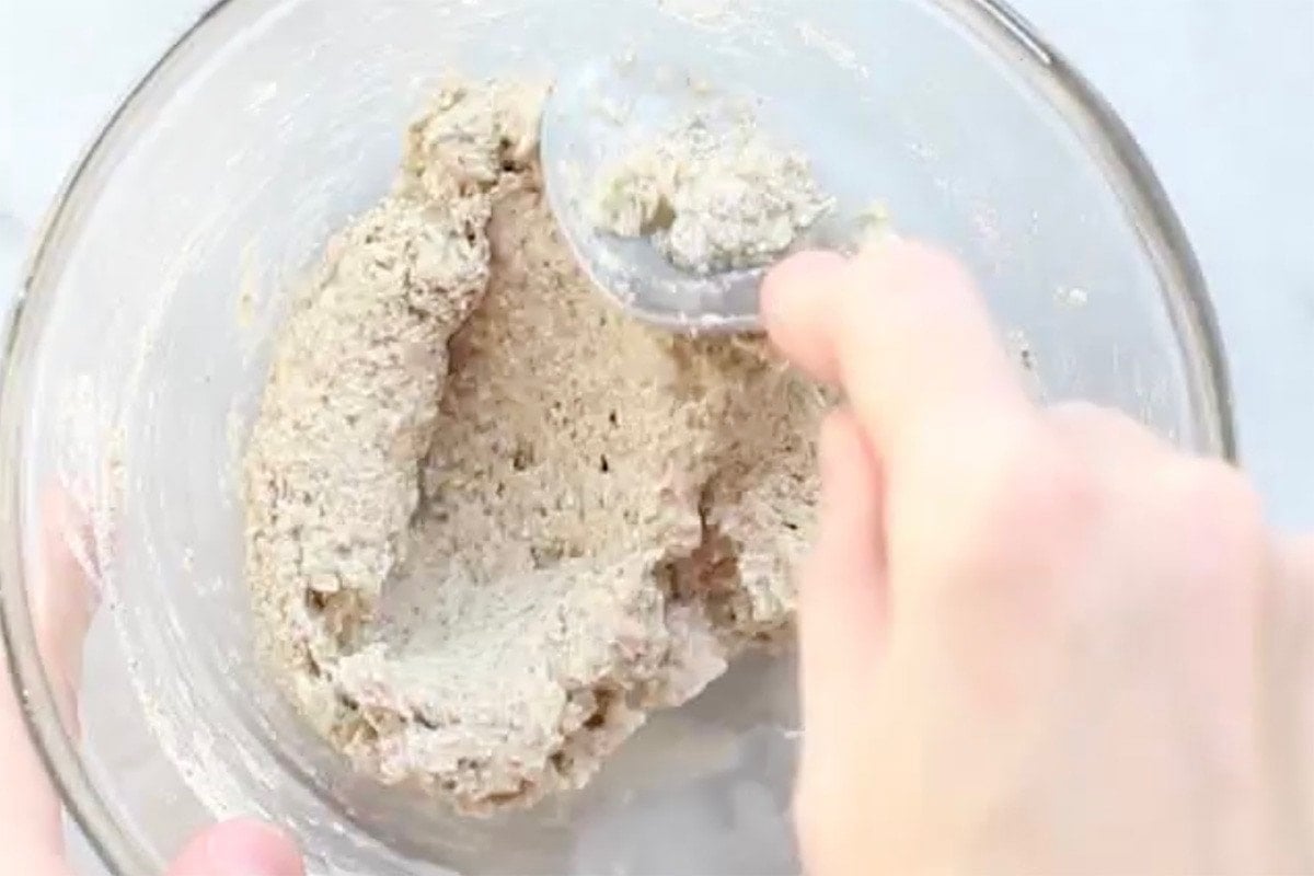 english muffin batter in a mixing bowl.