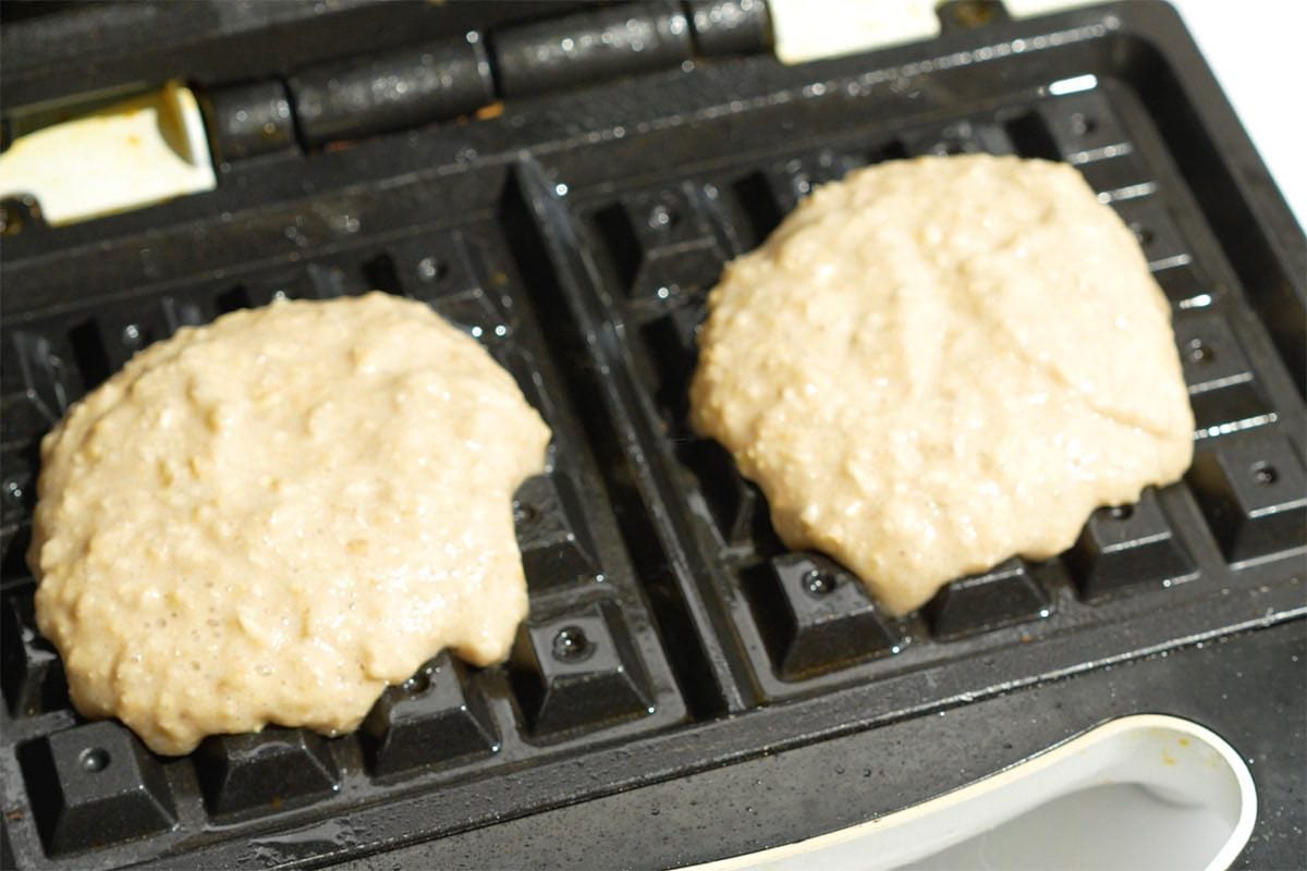 waffle batter on waffle iron.