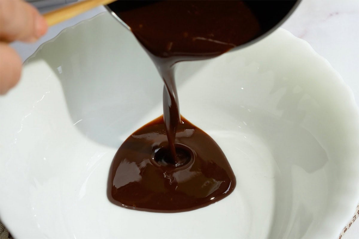 melted chocolate and butter poured into a bowl.