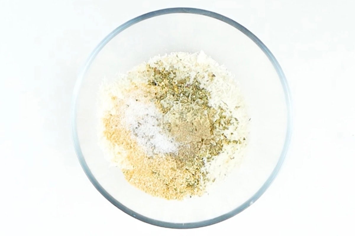 seasonings, Parmesan cheese, and panko in a bowl.