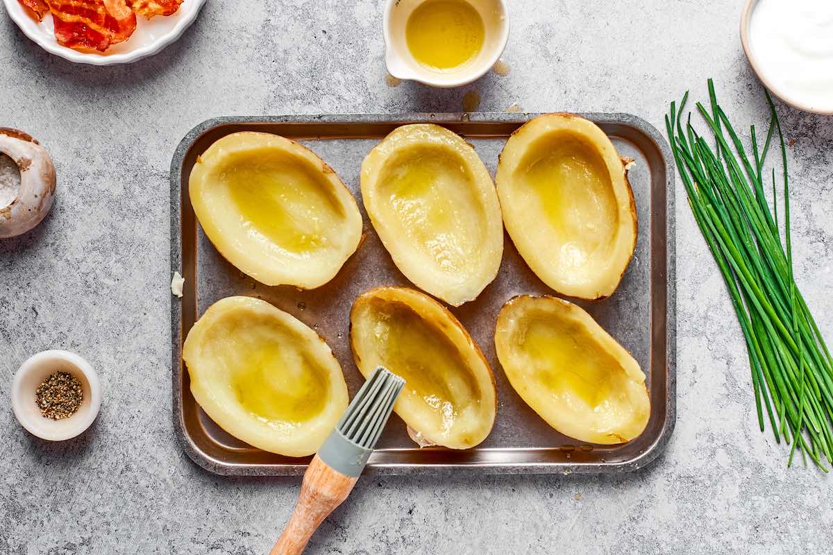 scooped out potatoes brushed with olive oil.