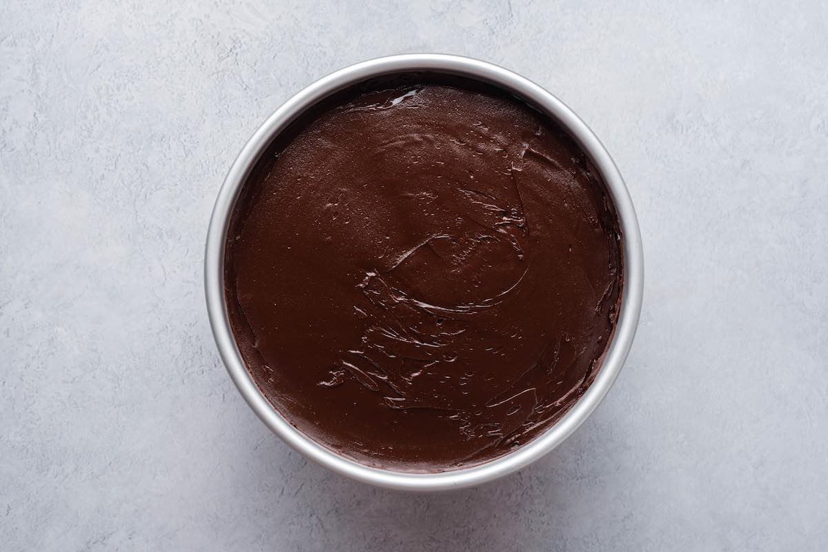 ganache added to brownie bottom cheesecake.