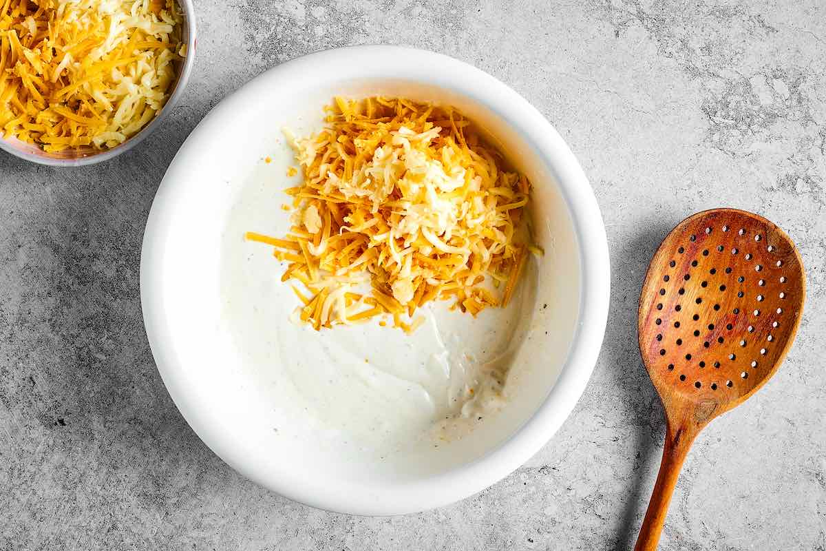 cheese mixture with shredded cheese folded in.