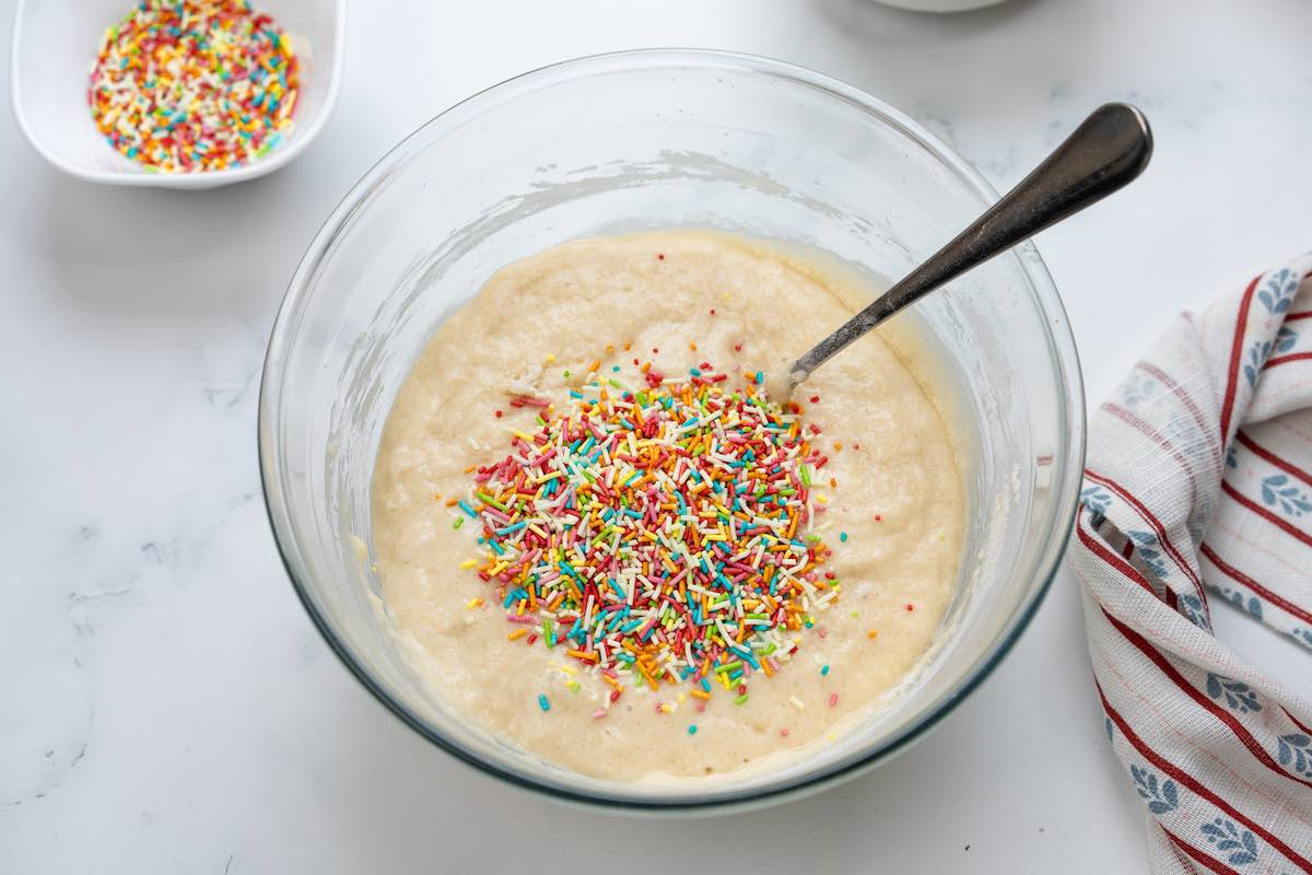 cake batter with sprinkles on top.